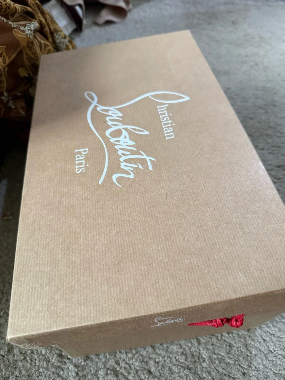Christian Louboutin bought them
